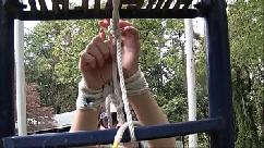 Nyssa nevers tied to the slide outdoor bondage